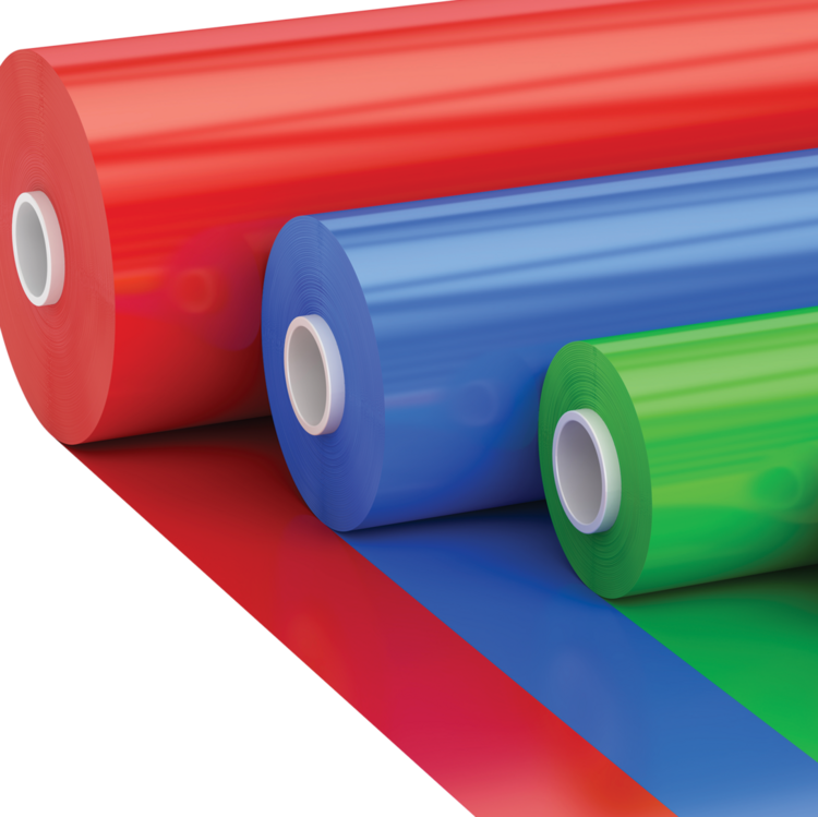 Rolls of red, blue, and green heat transfer vinyl (HTV), ideal for eco-friendly crafting, apparel designs, or custom printing.