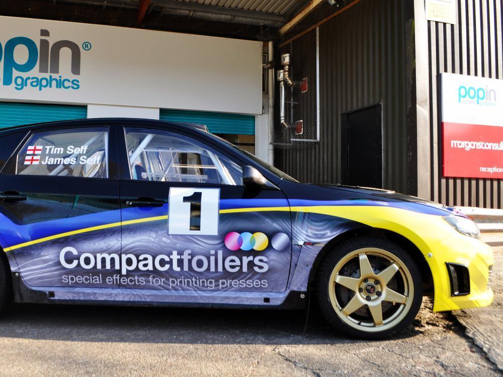 Branded vehicle wrap and graphics on Subaru Impreza B13 outside Popin in Cardiff.