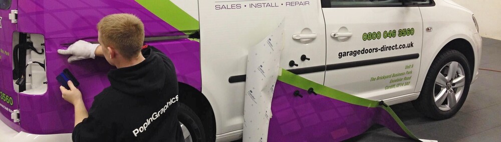 Eco-friendly branded vinyl wrap installed on commercial business van.