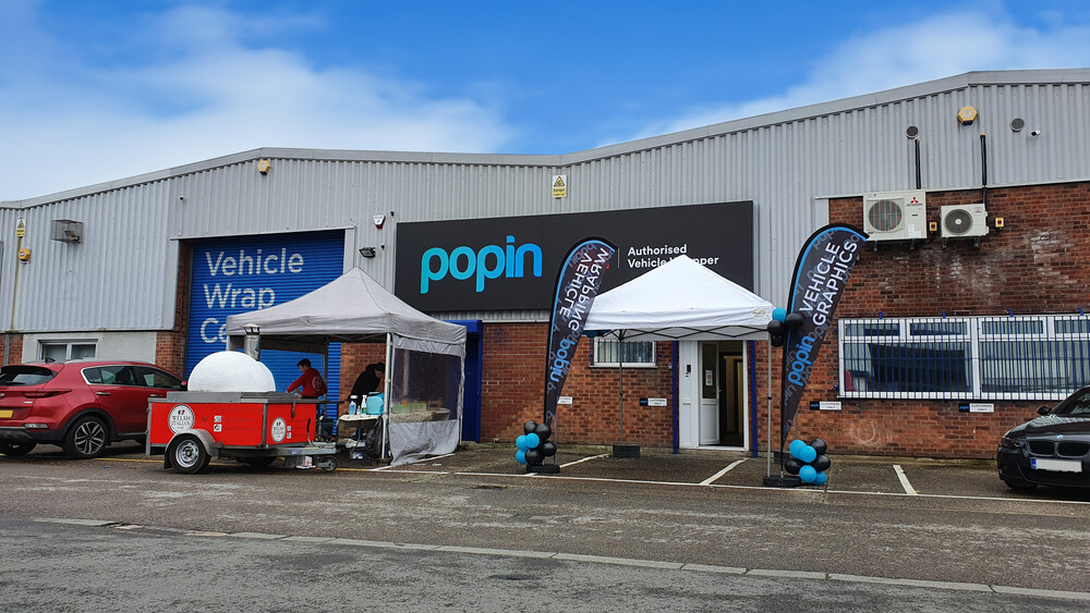 Entrance to Popin Graphics vehicle wrap and vinyl graphics facility during a 2020 open day in Cardiff