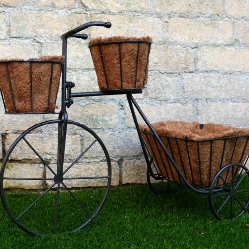 Large tricycle planter.