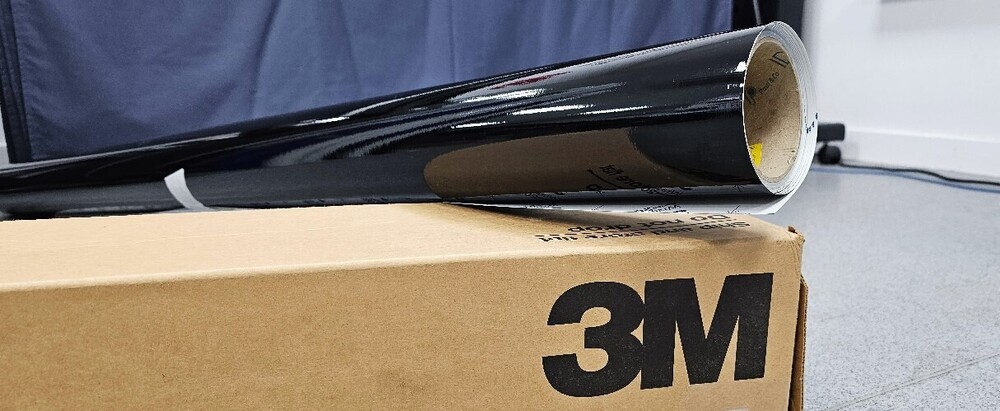 A roll of premium high-quality 3M vehicle vinyl material.