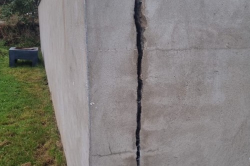 Retaining Wall crack  masonry repair using helical bars.
