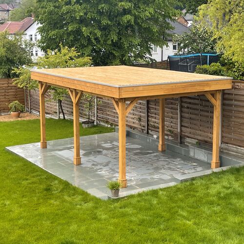 A bespoke garden gazebo supplied by Lugarde and designed and installed by Forevertimber. This open-sided structure features a flat roof and a natural timber finish, supported by sturdy wooden posts with decorative bracing for stability and style. The gazebo is set on a smooth stone-paved base, providing a durable and clean surface suitable for various uses such as outdoor dining, relaxation, or entertaining. Surrounded by a lush green lawn and bordered by a wooden privacy fence, this versatile structure blends seamlessly into the garden, offering both functionality and a touch of rustic elegance.