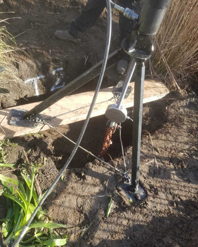 Piled anchor for underpinning foundations