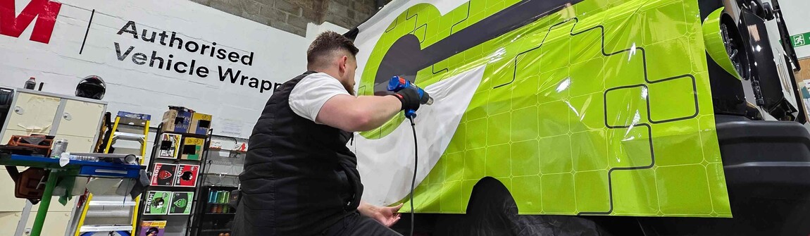 Sustainable premium wrap installation on electric commercial vehicle.