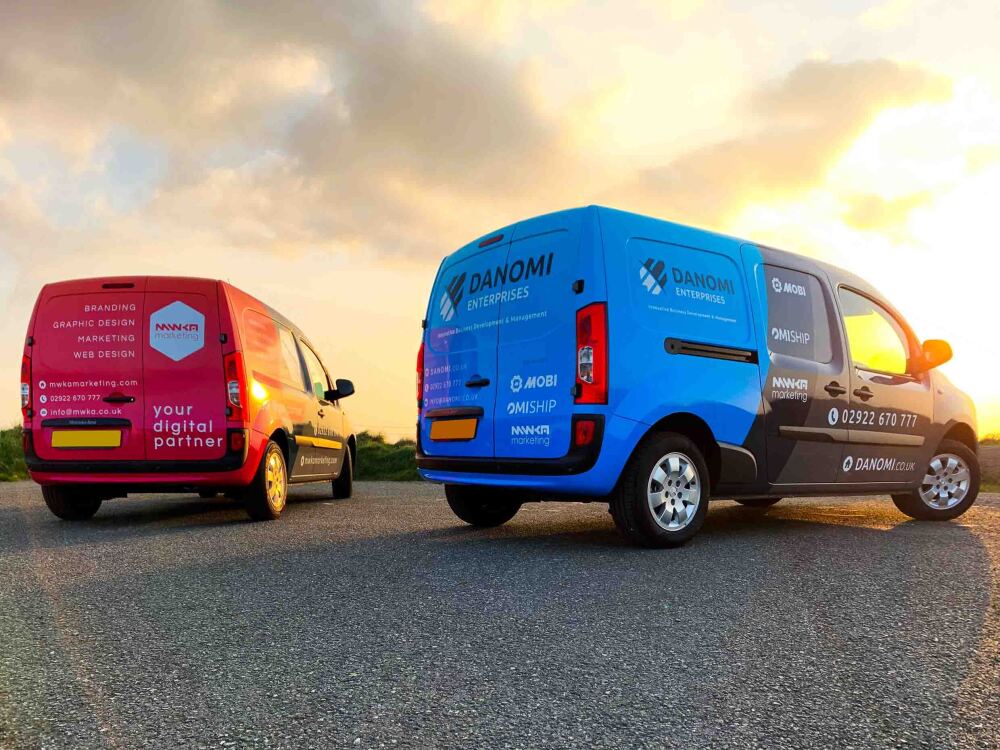 Fleet of Mercedes Citan vans with branded partial vehicle wraps for Danomi Enterprises.