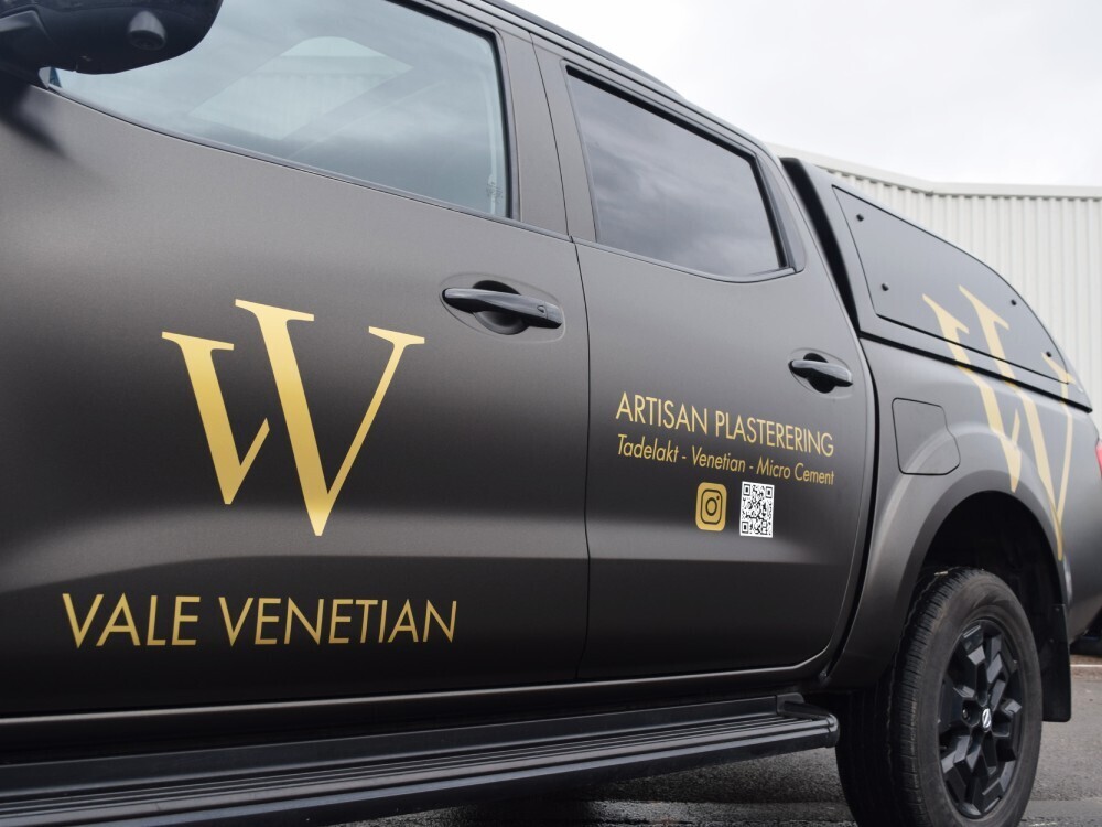 Gold company branded vinyl graphics for Vale Venetian on Nissan Navara double cab.