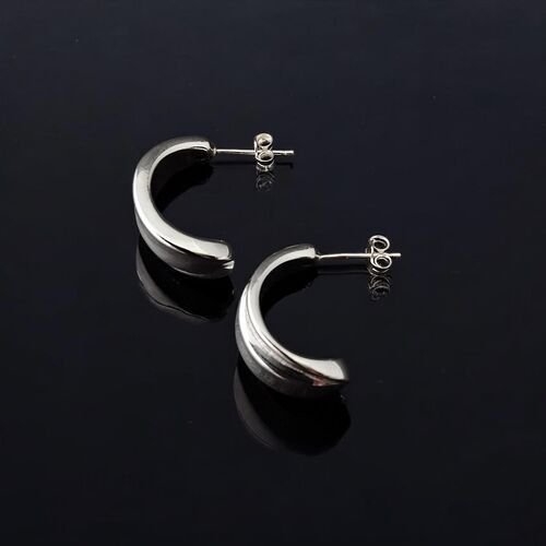 Sculptural silver huggie half hoops