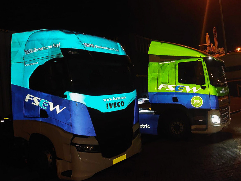 Fleet of Iveco S Way trucks with branded reflective wraps and graphics for FSEW.