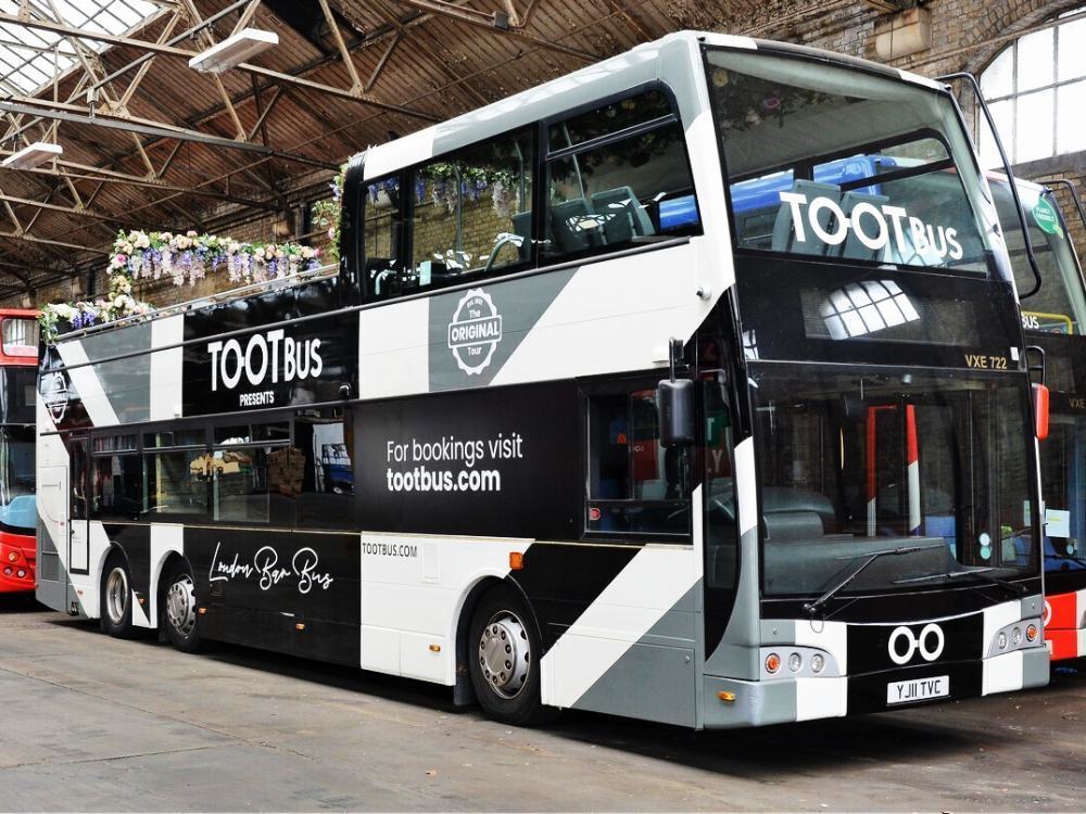 Black and white livery design on Tootbus London Bar Bus Optare VXE.