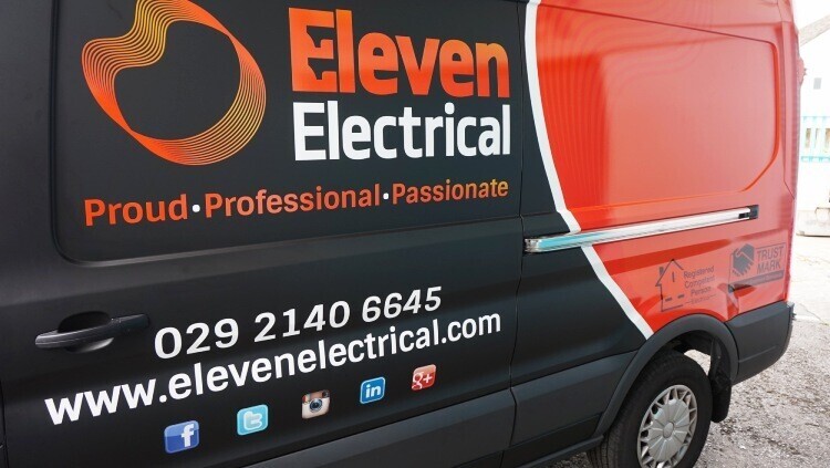 Company van vehicle graphics with social media icons.