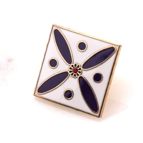 Badge. The Persian Cross. Purple Cross on White with Central Red stone.