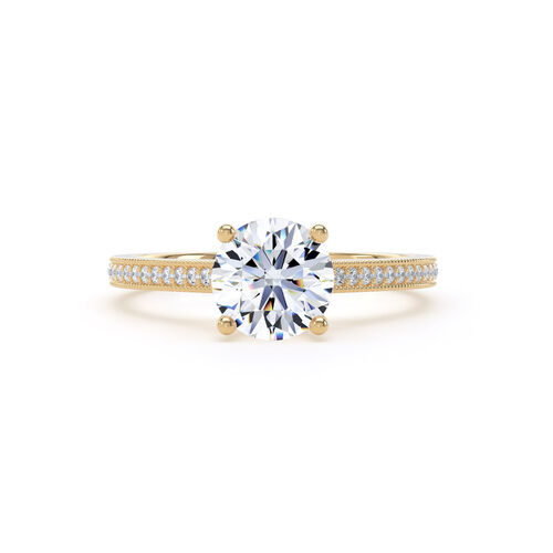 Round brilliant solitaire with mille-grain diamond set shoulders