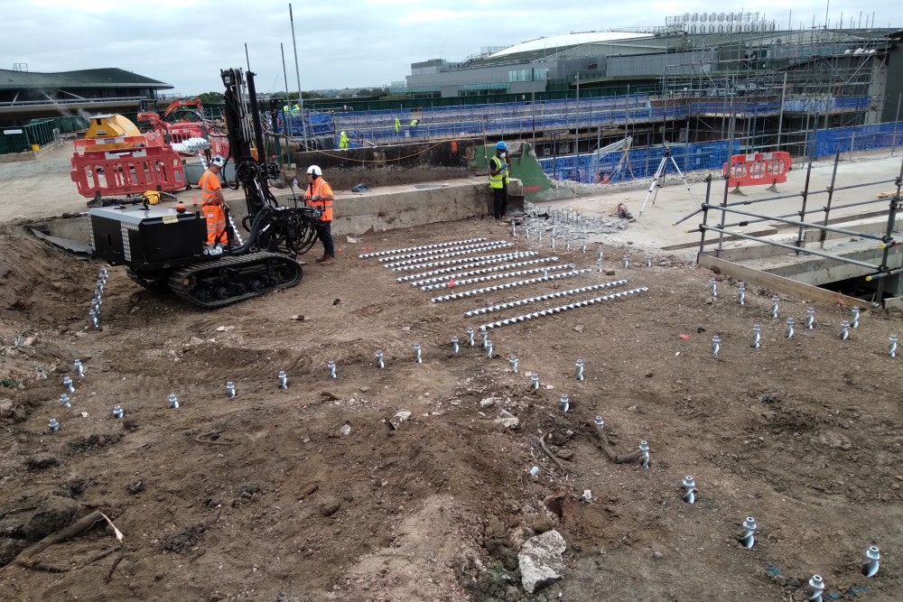 Piled anchor for underpinning foundations