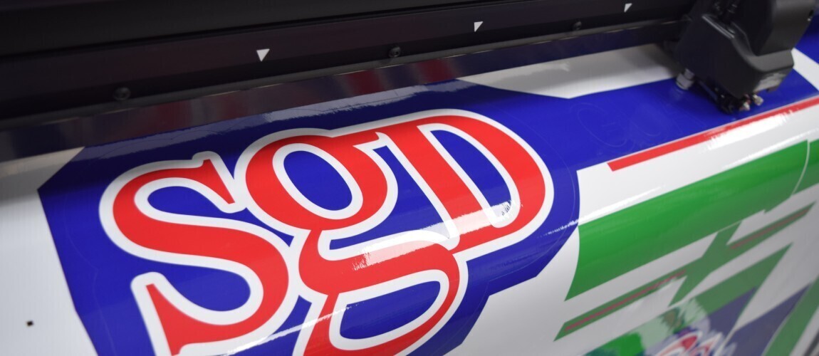 Vinyl graphic decals design being printed using wide-format printer