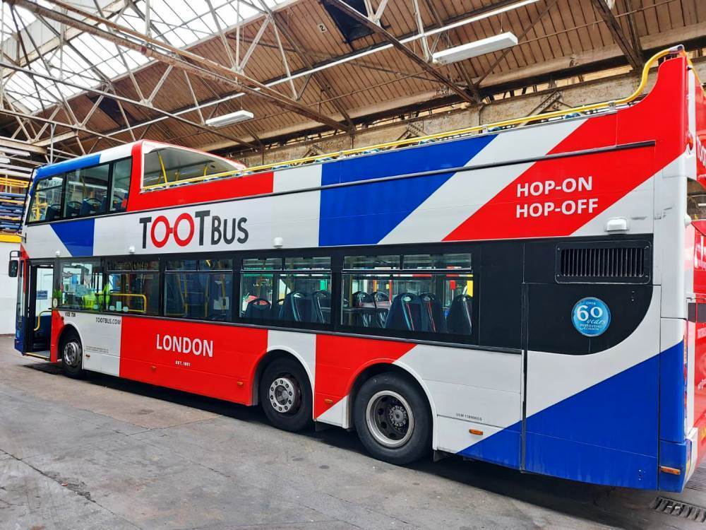 Tootbus London Union Jack vehicle wrap on Optare VXE open top tour bus.