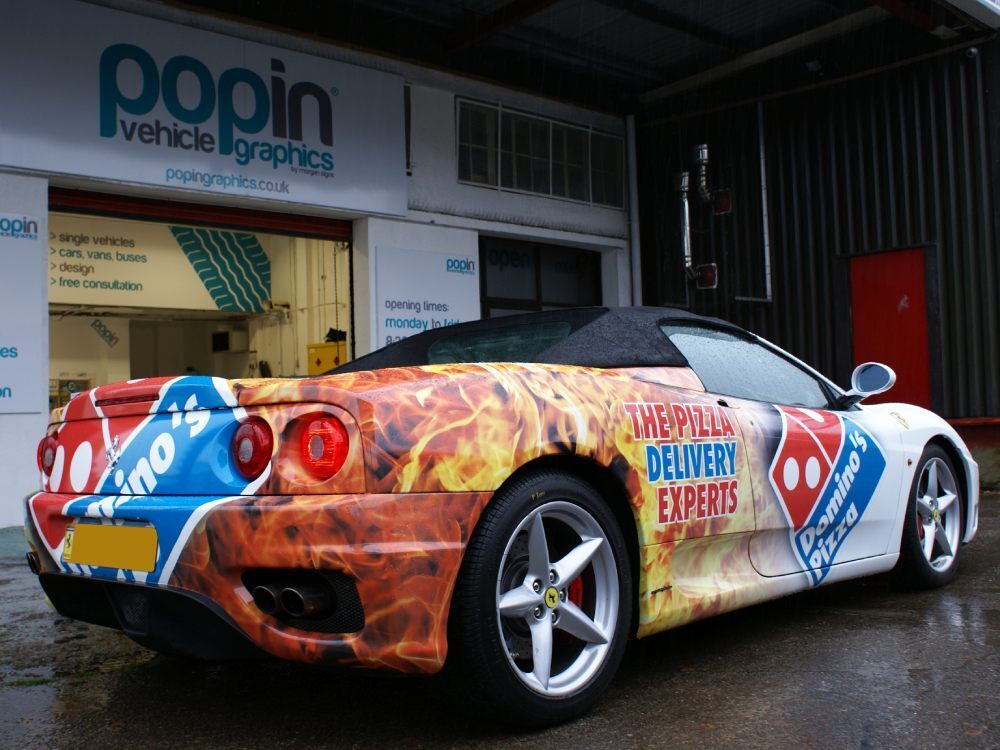 Domino's Pizza car wrap on a white Ferrari 360 Spider outside Popin in Cardiff.