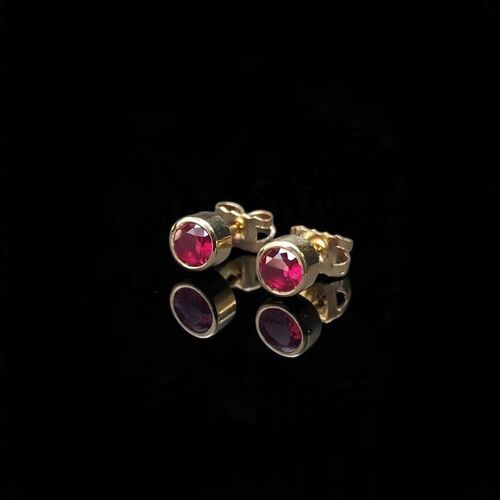 0.50ct rubover ruby stud earrings