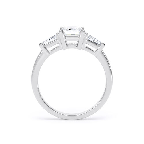 Emerald cut diamond and tapered baguette trilogy ring