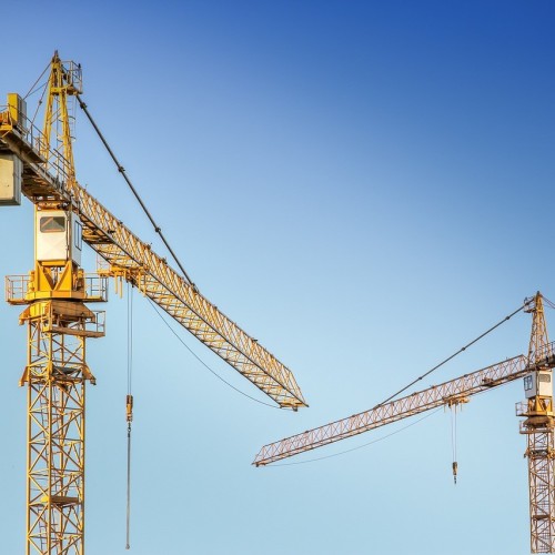 What are the key stages in a construction site survey?