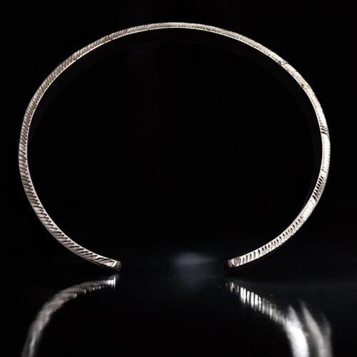 Sterling silver cuff bangle with diamond-cut detailing 