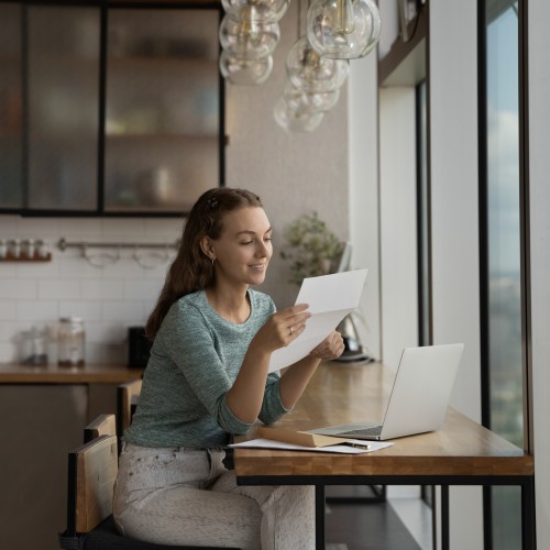 woman reviewing her payslip 
