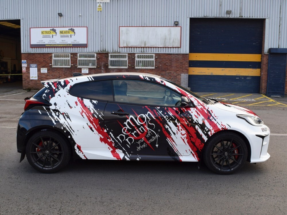 Race car livery and motorsport graphics on Toyota Yaris GR