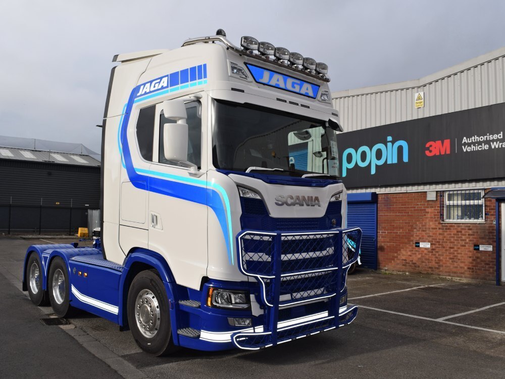 Scania truck with new vehicle wrap and vinyl graphics outside Popin in Cardiff.