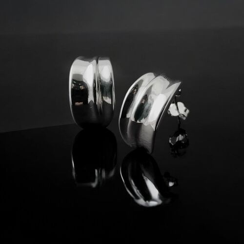 Sculptural silver huggie half hoops