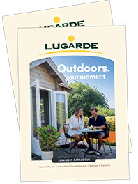 Front cover of the Lugarde catalog featuring the tagline 'Outdoors. Your moment.' The design showcases a cozy outdoor scene with a couple enjoying coffee at a patio table outside a modern timber building, surrounded by greenery. The catalog includes details on summerhouses, verandas, garden offices, and carports, reflecting Lugarde's expertise in creating high-quality outdoor living spaces