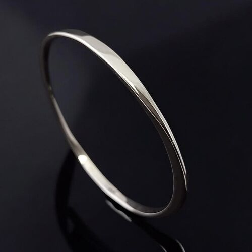 Sculptural sterling silver stacking bangle