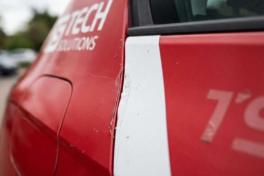 Poor visible joins on low quality vehicle vinyl material on company car.