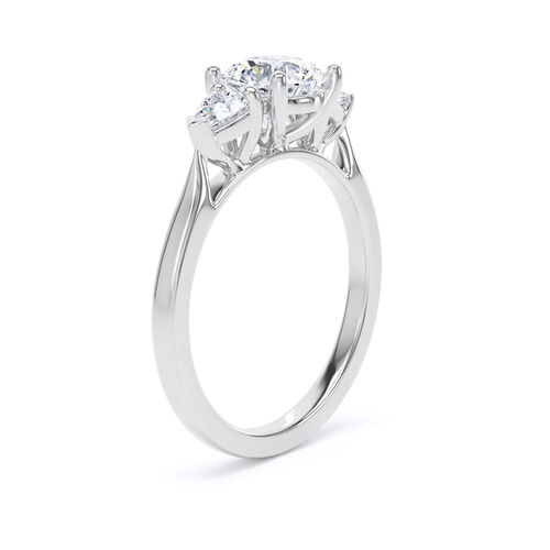 Round and pear diamond trilogy ring