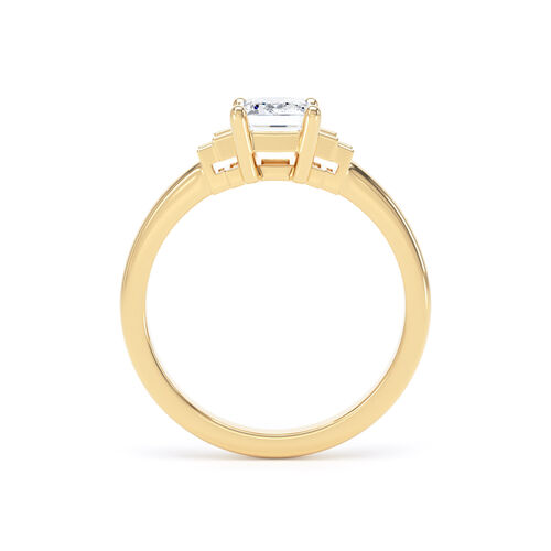 Emerald cut solitaire with stepped baguette cut diamond shoulders