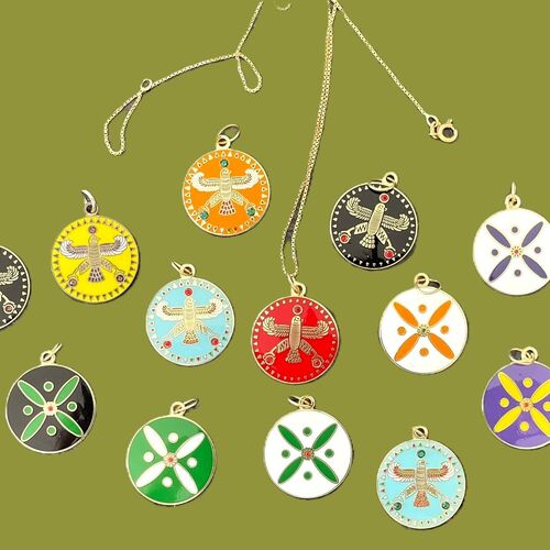 Round Pendant. The Persian Cross. White on Green  with 1 Central Red Stone.