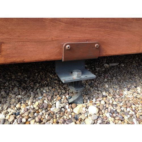 Permanent anchors for log cabins