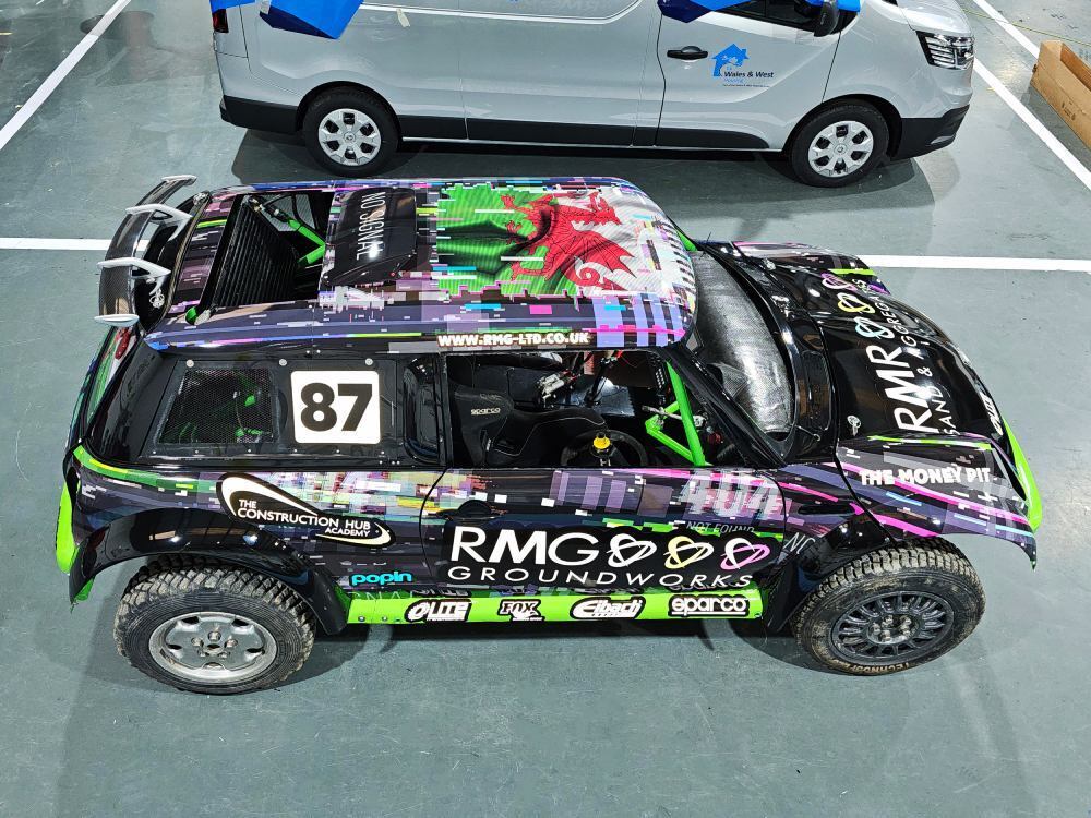 Colourful motorsport wrap and decals on a Mini Cooper V6 rally car