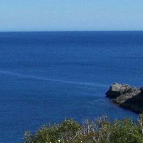 Modern villa with pool, large terraces, garden, and underground parking