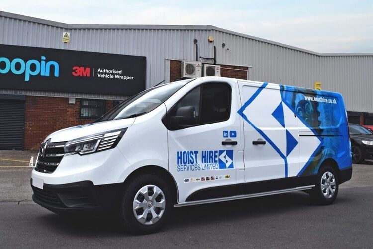 Renault Trafic vehicle with branded business van wrap and graphics outside Popin in Cardiff.