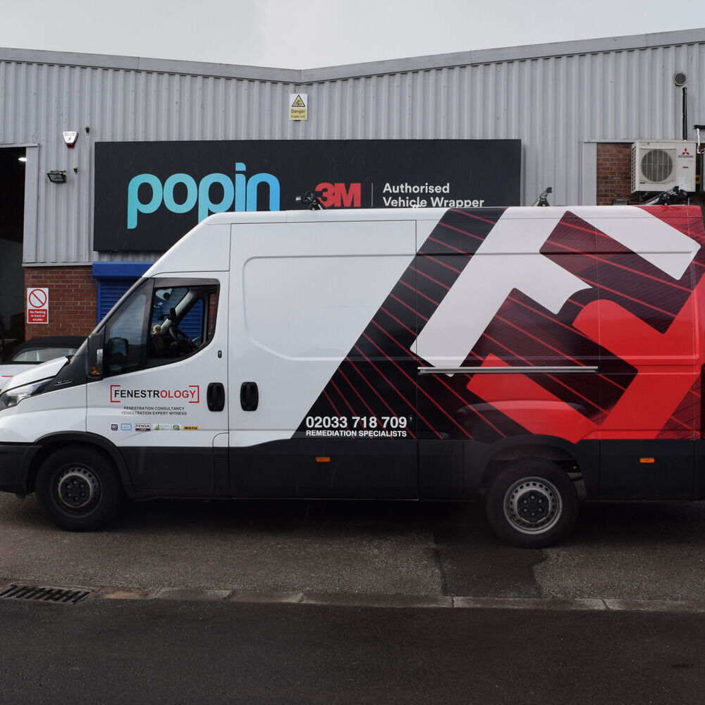 Business van with partial vinyl wrap