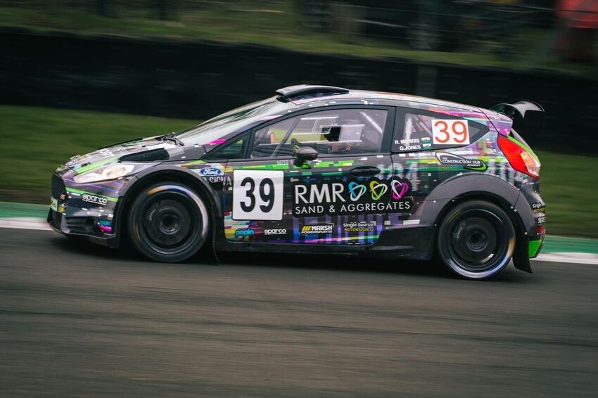Ford Fiesta R5 rally car with motorsport graphics and colourful race wrap