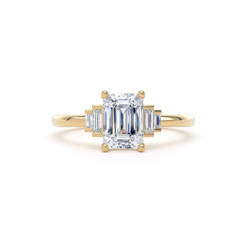 Emerald and baguette diamond ring