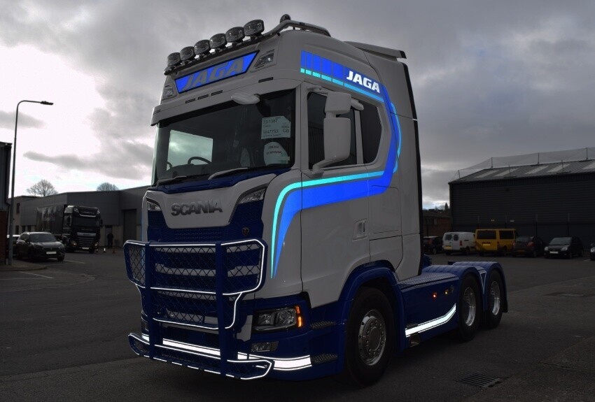 Scania fleet lorry with 3M IJ780mc reflective vinyl branding applied to front panels.