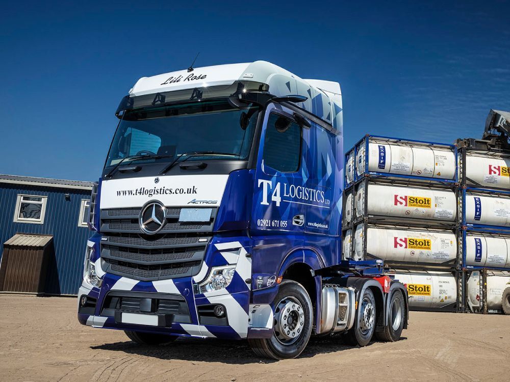 New branded vehicle wrap and graphics on a Mercedes Actros.