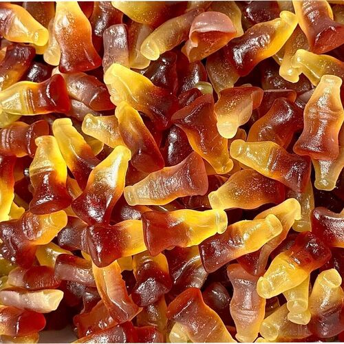 Cola Bottles  - Glucose Syrup, Sugar, 6% Juice (Grape, Pear, Pineapple, Peach) from Concentrate, Gelatine, Humectant (Sorbitols), Corn Starch, Citric Acid, Gelling Agent (Pectins), Fruit and Vegetable Concentrates (Carrot, Apple, Hibiscus, Molasses), Flavourings, Glazing Agent (Carnauba Wax, Beeswax).