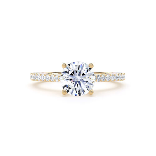 Round brilliant solitaire with diamond set shoulders