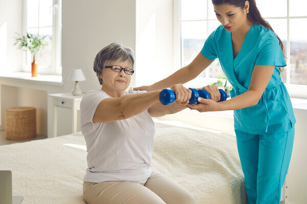 Elderly Patient exercises with physio