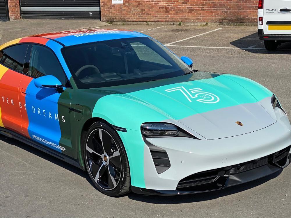Block colours vehicle wrap on Porsche Taycan Turbo.