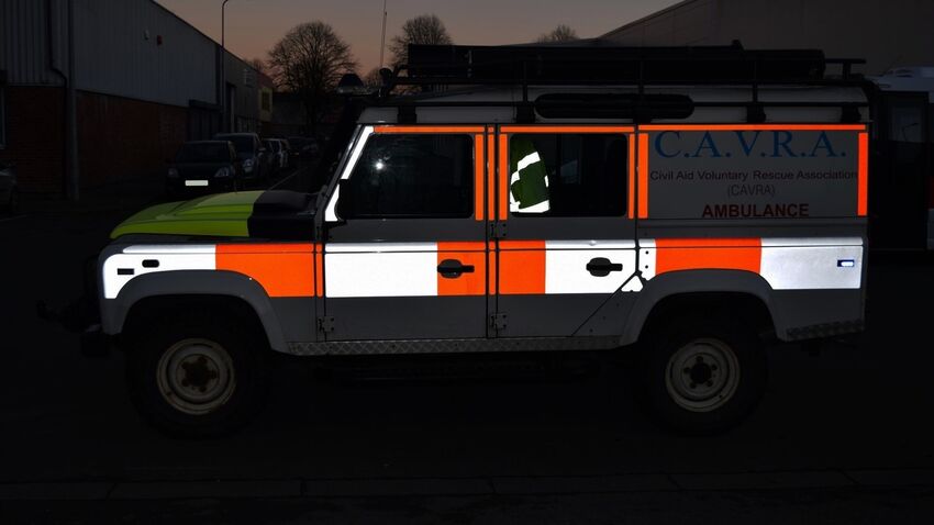 High conspicuity reflective vinyl graphics on an ambulance
